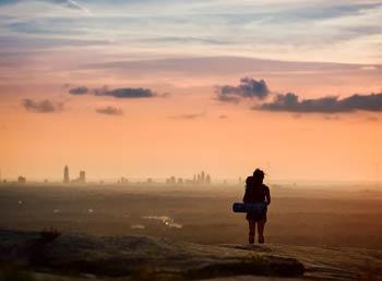 Hiker view of a very distant city skyline
