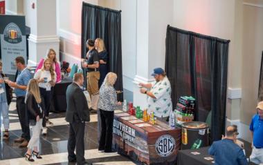 Attendees visiting with vendors at GTC2022